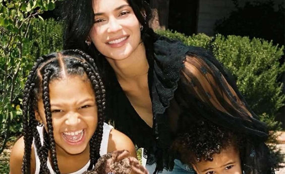 KYLIE JENNER HUGS SON AIRIE, 4, AND DAUGHTER STORMI, 8, IN PHOTOS FROM JUNE PHOTO DUMP