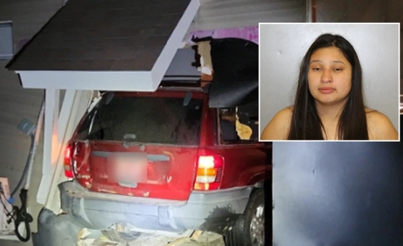 WOMAN ALLEGEDLY CRASHES HER EX'S CURRENT GIRLFRIEND'S CAR THROUGH HIS HOUSE, FIGHTS THE POLICE. 