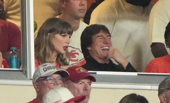 TOM CRUISE REVEALS WHAT HE AND TAYLOR SWIFT TALKED ABOUT AT CHIEFS GAME