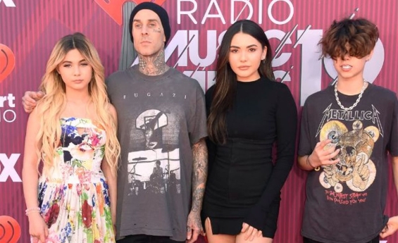 TRAVIS BARKER REVEALS WHY HE NEEDED SURGERY AFTER HOSPITAL PHOTOS SPARKED CONCERN