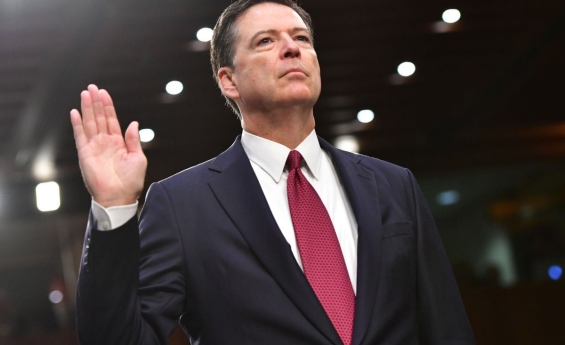 FORMER FBI DIRECTOR JAMES COMEY SURRENDERS TO AUTHORITIES