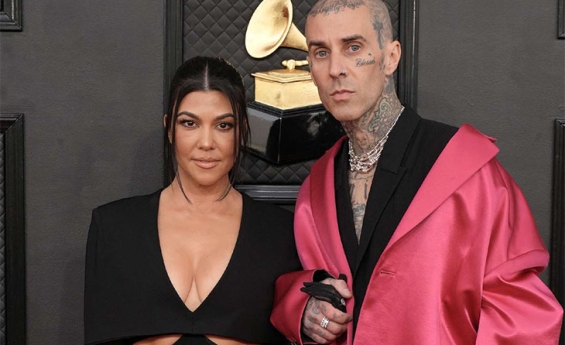 KOURTNEY KARDASHIAN AND TRAVIS BARKER TWIN IN GOTH-INSPIRED LOOKS FOR BLENDED FAMILY OUTING