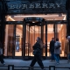 BURBERRY TO CUT JOBS AMID HEAVY LOSES