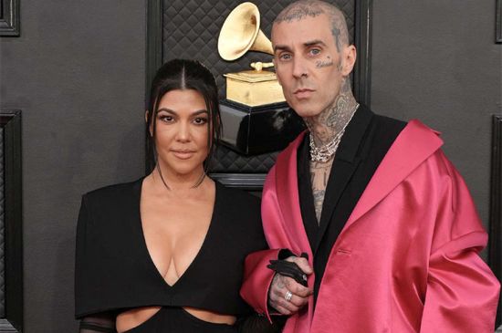 KOURTNEY KARDASHIAN AND TRAVIS BARKER TWIN IN GOTH-INSPIRED LOOKS FOR BLENDED FAMILY OUTING