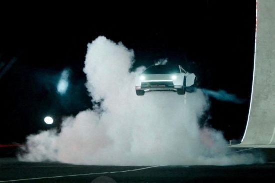 TESLA UNVEILS FUTURISTIC ROADSTER WITH MID AIR THRUSTERS