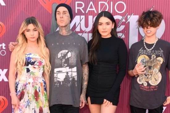 TRAVIS BARKER REVEALS WHY HE NEEDED SURGERY AFTER HOSPITAL PHOTOS SPARKED CONCERN